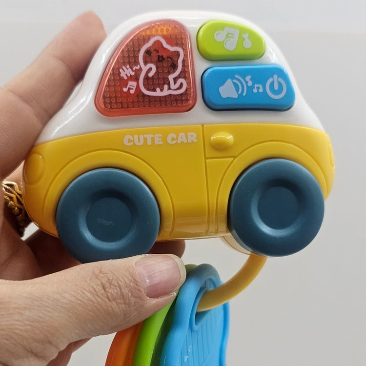 اسباب بازی ناب سل مدل جغجغه دندان گیر طرح ماشین موزیکال چراغدار به همراه کلید کد MUSICAL CAR CUTE BABY TOYS