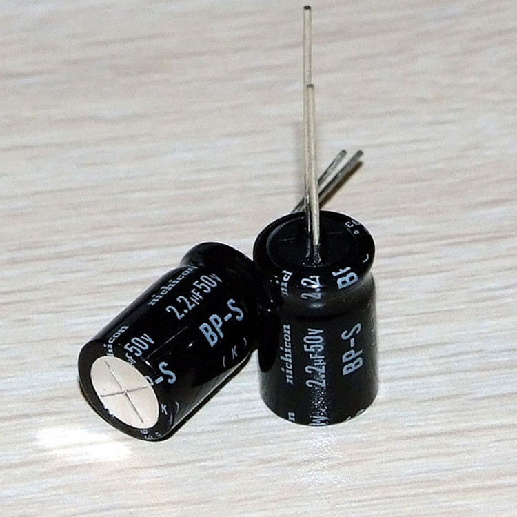 خازن 2.2 میکروفاراد 50 ولت کد Ca2.2uf-50V بسته 12 عددی
