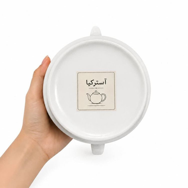 قوری آسترکیا مدل نیلوفر گنجایش 700 میلی لیتر به همراه وارمر