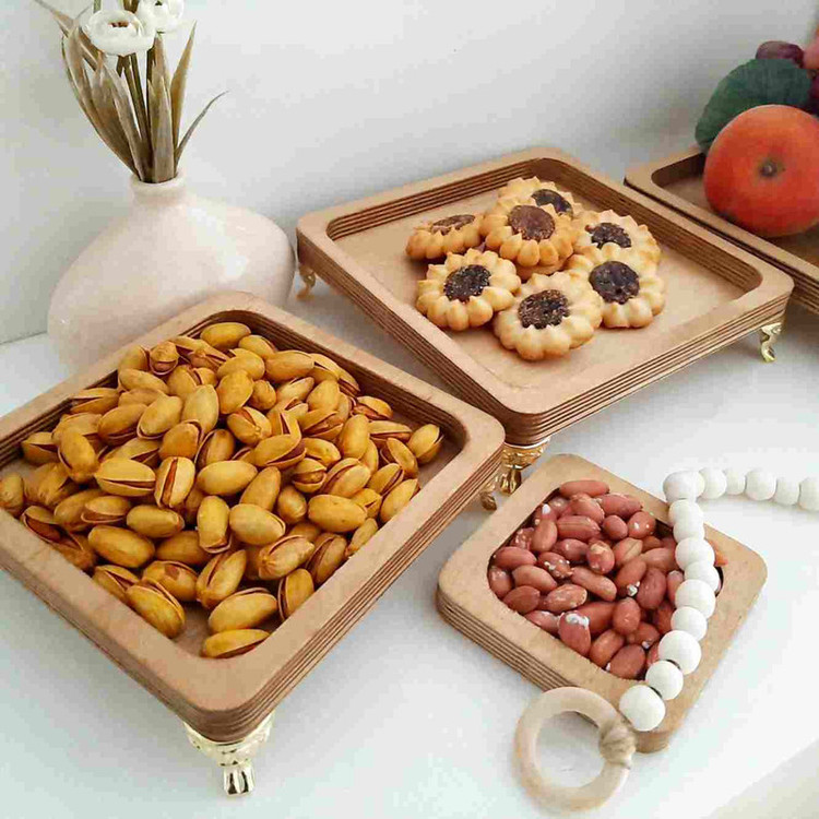 ظرف سرو چوبی پایهدار مدل ply05 مجموعه 5 عددی از چوب روس باکیفیت، ضدآب و بادوام مناسب آجیلخوری، میوهخوری و شکلاتخوری، قابلیت شستوشو با دست و استفاده در میهمانی و پذیرایی
