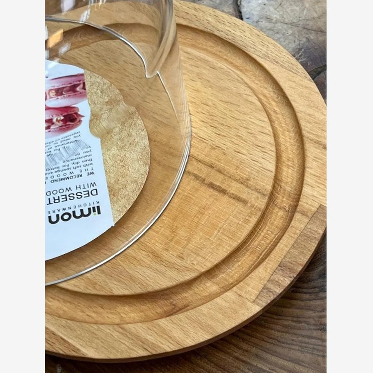 ظرف سرو پنیر پایه چوبی با درپوش شیشهای شفاف، ابعاد 17.5×17.5×16، وزن 500 گرم، مناسب شستشو با دست، فرم دایرهای