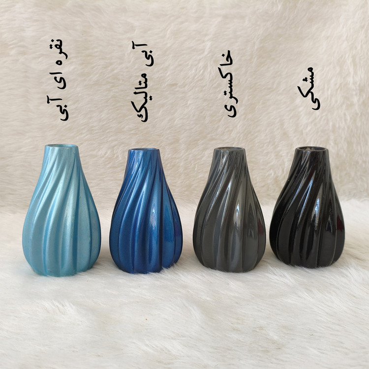 گلدان دکوری رومیزی مدل پیچک مناسب گلهای آپارتمانی با ابعاد 15x8x8 سانتیمتر و پوشش براق محافظ و طراحی موجدار زیبا