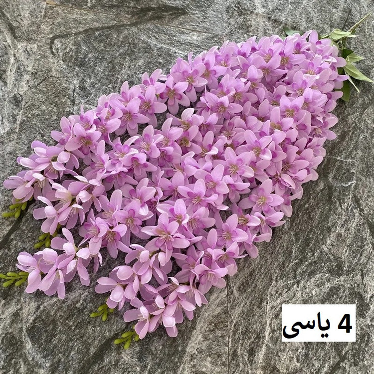 گل مصنوعی مدل آویز ارکیده با 5 شاخه گلدار، قابل تنظیم، قابل شستشو و انعطاف پذیر، مناسب فضای باز و گلهای آپارتمانی با نصب دیواری، آویزی و ایستاده، ابعاد 85x23x5 سانتیمتر و وزن 110 گرم